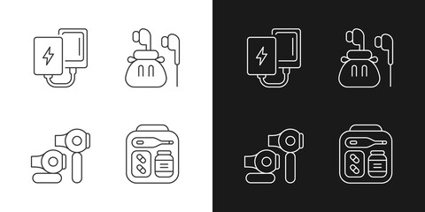 Fototapeta premium Traveller luggage linear icons set for dark and light mode. Compact powerbank and headphones. Customizable thin line symbols. Isolated vector outline illustrations. Editable stroke