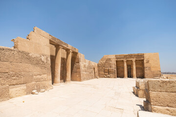The Mortuary Temple Of Khufu at Giza Pyramid complex revealing part of the Pyramid of Khufu in the...