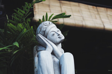 Balinese statue Stone figure of the God. Bali, Indonesia.