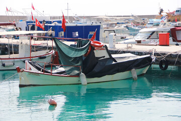 Fototapeta na wymiar Antalya, Turkey, May 23, 2021. Pleasure boats and yachts in the blue sea.