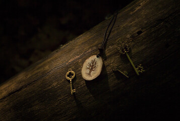 Tree pendant and three copper keys