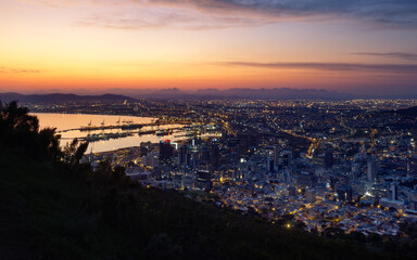 Fototapeta na wymiar Low light aerial view of sunrise over the city of Cape Town in winter. South Africa.