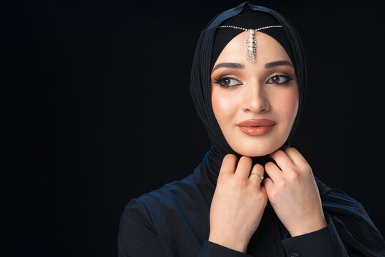 Close up portrait of beautiful muslim girl dressed in hijab