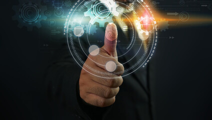 Businessman login with fingerprint scanning technology. fingerprint to identify personal, security...