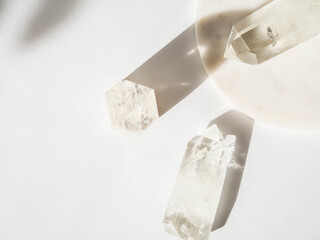 Collection of crystals quartz on a white background with shadows