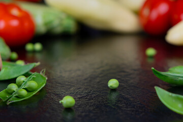 background with vegetables on a black background. copy paste. template for text, mocap