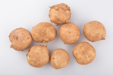 fresh potatoes isolated on a white background.