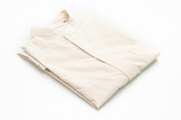 beige shirt fold on white background