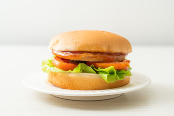 chicken burger with sauce on plate