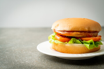 chicken burger with sauce on plate