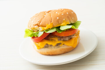 pork burger with cheese on plate