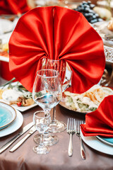 wine glasses on the background of a red napkin in a cafe