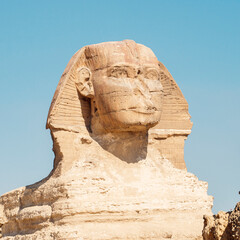 Close up of Great Sphinx of Giza, Egypt. Limestone statue of a reclining sphinx, mythical creature...