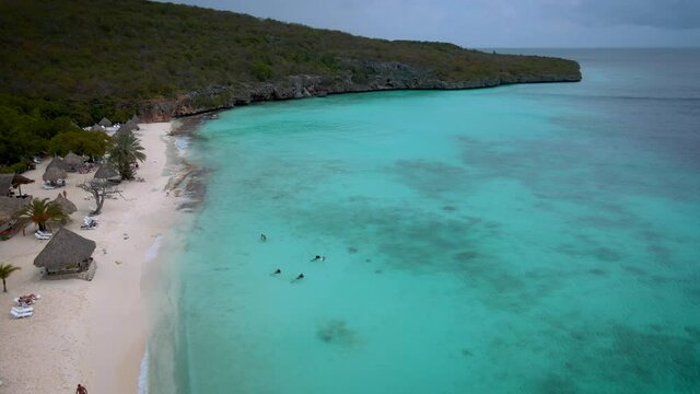  Cas Abou Beach on the Caribbean island of Curacao, Playa Cas Abou in Curacao Caribbean tropical white beach with the blue ocean. drone footage