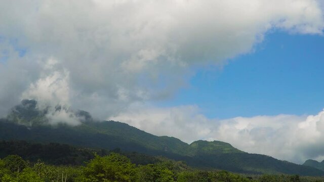 Mountains covered with tropical forests. Hibok-Hibok Volcano. Camiguin, Philippines. Travel concept.