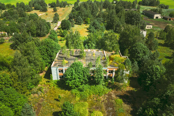 Fototapeta premium Belarus. Aerial View Of Abandoned Store In Chernobyl Zone. Chornobyl Catastrophe Disasters. Dilapidated House In Belarusian Village. Whole Villages Must Be Disposed. Chernobyl Resettlement Zone