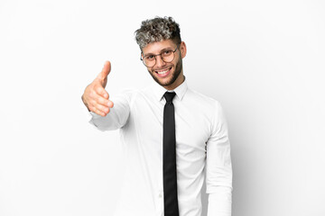 Business caucasian man isolated on white background shaking hands for closing a good deal