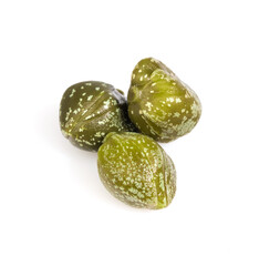 Pile of pickled capers isolated on white background with clipping path, macro