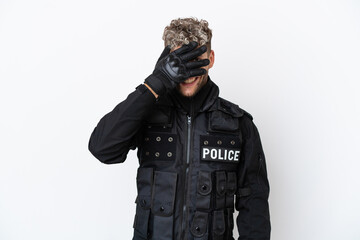 SWAT caucasian man isolated on white background covering eyes by hands and smiling