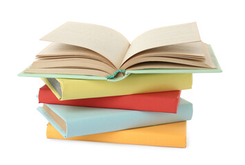 Many colorful hardcover books on white background