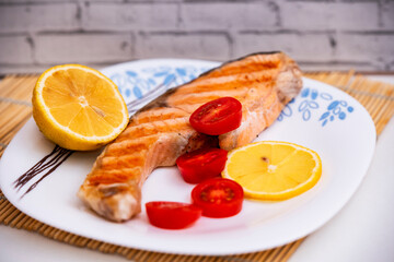 grilled salmon with vegetables on a plate