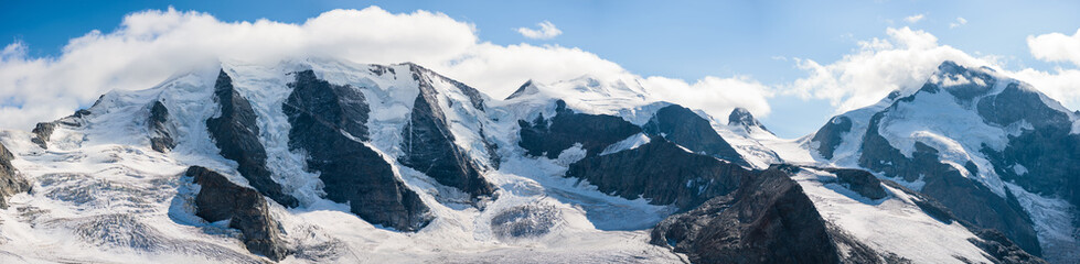 View for Morteratsch Glacier and panorama of Piz Berinia and Piz Palu in Switzerland. Swiss Alps.
