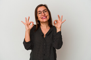 Middle age caucasian woman isolated on white background cheerful and confident showing ok gesture.