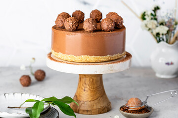 Cold chocolate cheesecake with truffle and cocoa powder