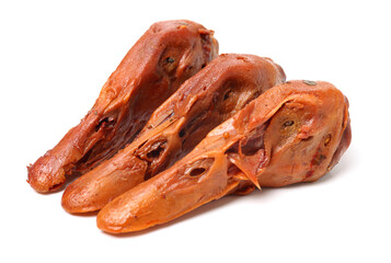 Duck head with marinated sauce on white background