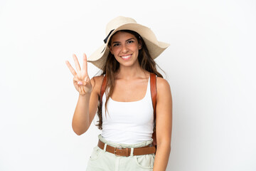 Obraz na płótnie Canvas Young caucasian woman wearing a Pamela in summer holidays isolated on white background happy and counting three with fingers