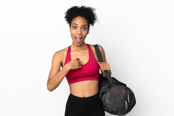 Fototapeta na wymiar Young sport african american woman with sport bag isolated on blue background with surprise facial expression
