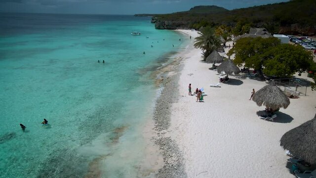  Cas Abou Beach on the Caribbean island of Curacao, Playa Cas Abou in Curacao Caribbean tropical white beach with the blue ocean. drone footage