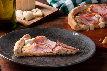 .Brazilian-style sirloin pizza with mozzarella, hearts of palm and corn