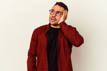 Fototapeta premium Young caucasian man isolated on white background being shocked, she has remembered important meeting.