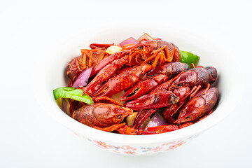 Spicy crayfish in a pot on white background