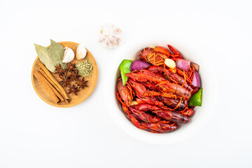 Spicy crayfish in a pot on white background