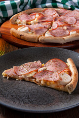 .Brazilian-style sirloin pizza with mozzarella, hearts of palm and corn