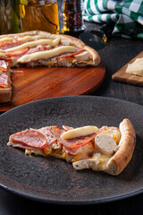 .Brazilian-style sirloin pizza with mozzarella, hearts of palm and corn. Topped with cream cheese