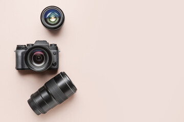 Digital camera and lenses on color background