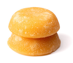 two cakes of palm sugar isolated on white background