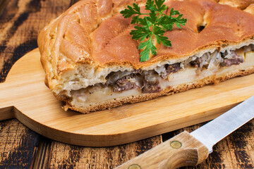 meat pie on a wooden table