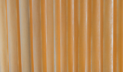 Close up golden color curtain texture background