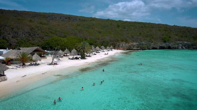  Cas Abou Beach on the Caribbean island of Curacao, Playa Cas Abou in Curacao Caribbean tropical white beach with the blue ocean. drone footage