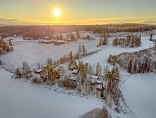 Drone picture of winter fields and cottages