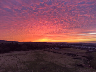 Sunset over fields and farmland
