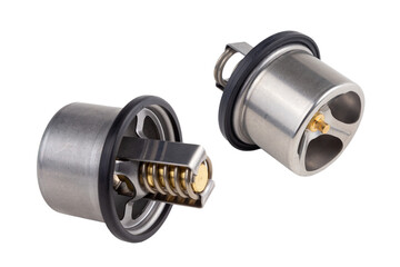 set of two thermostats of the truck engine cooling system. Spare parts on white background