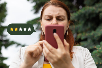 Customer Experience Concept. Close up on woman hand press on smartphone screen with gold two star rating feedback icon - obrazy, fototapety, plakaty