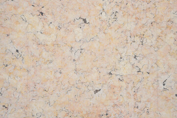 mottled light beige and gray stone tile background