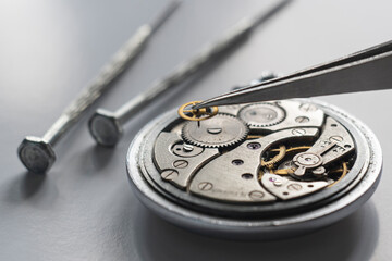 Watchmaker repair mechanical watches. Gears repair. Watch repair process