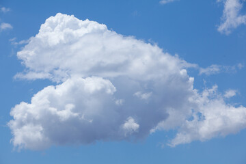 Selected Single Clouds with Bright Blue Sky Background